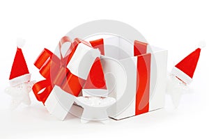 White gift box with red ribbon