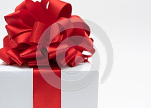 White gift box red ribbon