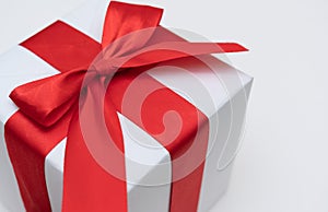 White gift box red ribbon