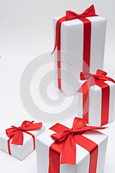 White gift box red ribbon