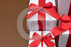 White gift box red ribbon