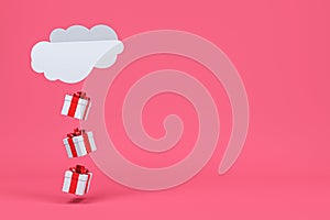 White gift box red ribbon drop from cloud in pink background minimal Christmas concept idea