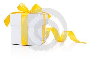 White gift box tied yellow ribbon bow Isolated on white background