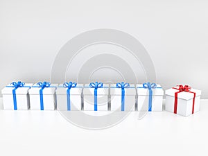 White gift boxes with blue ribbons, one with red ribbon that stands out