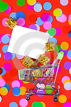 White gift card in carriage on bright desk