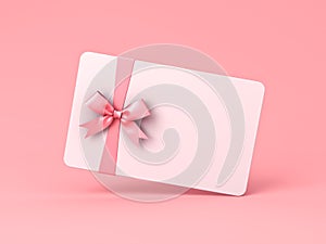 White gift card with pink ribbon bow on pink pastel color background with shadow minimal concept