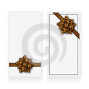 White gift cards with a black and orange tied bow, realistic shadows and copy space. 9 May - Victory day template design