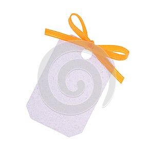 White gift tag with orange ribbon bow