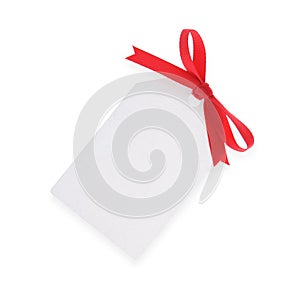 White gift tag with red bow