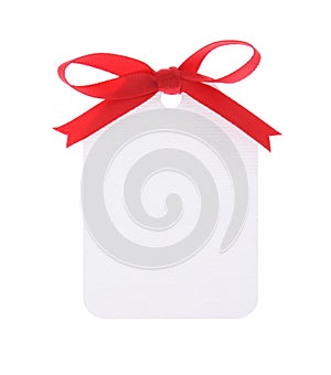 White gift tag with red bow