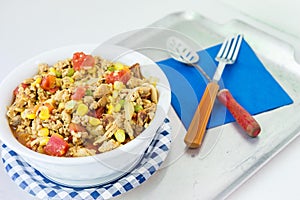 White glass bowl full of hot chicken chili.