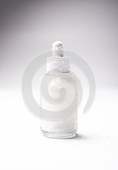 White glass cosmetic bottle mock-up with blank copy space