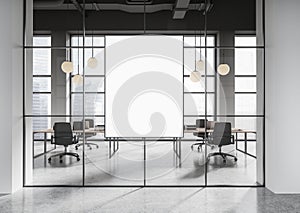 White and glass open space office interior with poster