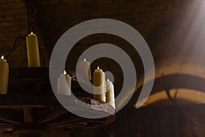 White glowing lanterns with delicate design on table in an old house.