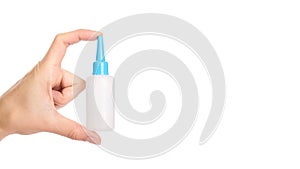 White glue container in hand isolated on a white background. copy space, template