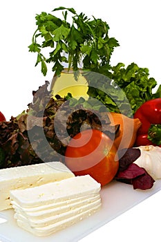 White goat feta cheese and fresh raw vegetables
