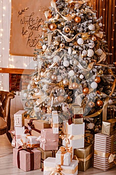 White and gold balls on the Christmas tree