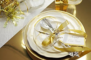 White and gold Happy New Year elegant fine dining table place setting