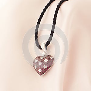 White Gold Heart Shaped Pendant With Rubies And Diamonds