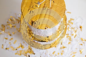 White and gold paper wedding cake, piÃ±ata cake.