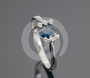 White gold ring with blue sapphire
