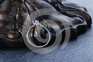 White gold wedding diamond ring on black background