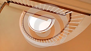 White and Golden Brown Wooden Spiral Staircase