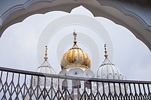 White and golden domes of mosques photo