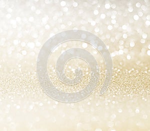 White golden glitter bokeh texture background