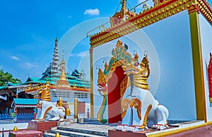 Chinthe lions at the Ubosot of Wat Chong Kham Temple, Mae Hong Son, Thailand photo