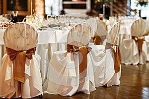 White and golden wedding chairs