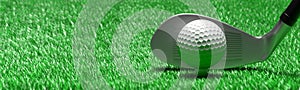 White golf ball on green grass golf course, close up view. 3d illustration