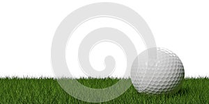 White golf ball on green grass or lawn over white background with copy space