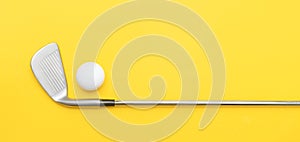 White golf ball and stick on yellow background. Horizontal sport poster, greeting cards, headers, website