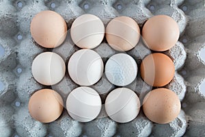 White golf balls in the box for eggs decoration