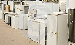 White goods piled up in recycling center.