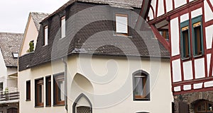 White gothic house with black roof tiles Germany