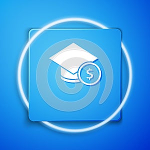 White Graduation cap and coin icon isolated on blue background. Education and money. Concept of scholarship cost or loan