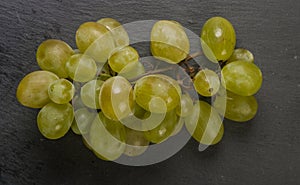 White grape on black background