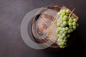 White grape on old wine barrel