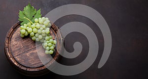 White grape on old wine barrel