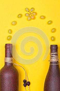 White grapes are poured into stone bottles