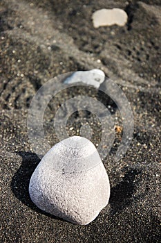 White gravel, black sand, bokeh, blurred backdrop