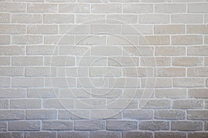 White and gray brick wall texture. Abstract weathered texture stained old stucco light gray and aged paint white brick wall backgr