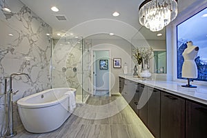 White and gray calcutta marble bathroom design