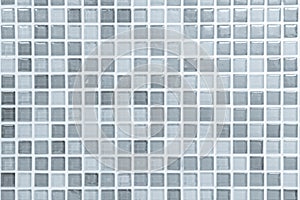 White or gray ceramic wall and floor tiles abstract background. Design geometric mosaic texture decoration of the bedroom. Simple