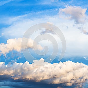 white and gray cumuli clouds in dark blue sky photo