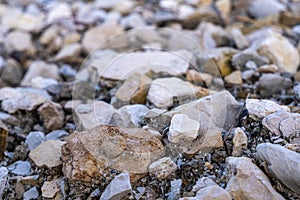 White-gray gravel and rubble close-up. Rubble stones, photos with low depth of field