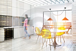 White and gray kitchen and a dining room side blur