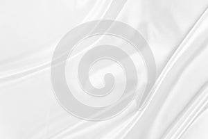 White gray satin texture that is white silver fabric silk background .